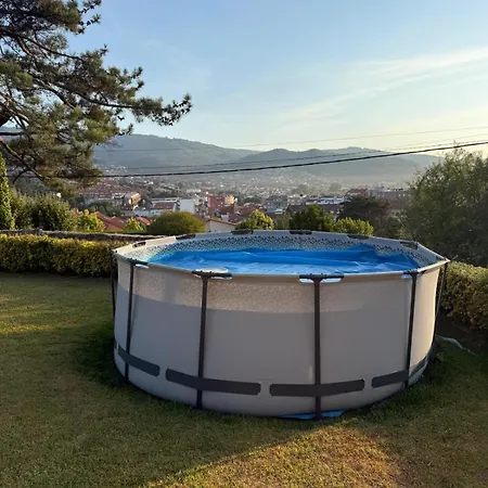 Casa chalet con jardín, a 5 min de Playa América Hébergement de vacances